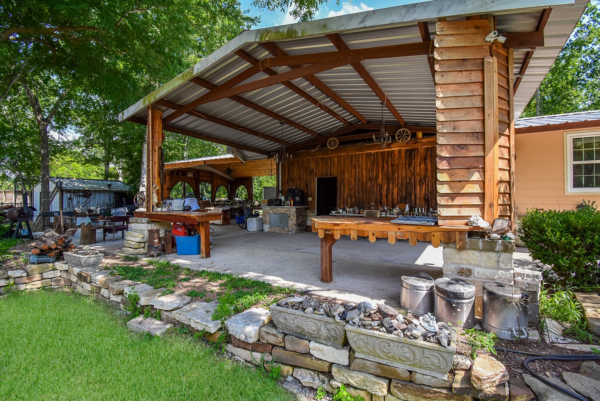 39551 Donigan Road Brookshire, TX 77423 - Photo 11 of 37 a view of backyard with swimming pool table and chairs