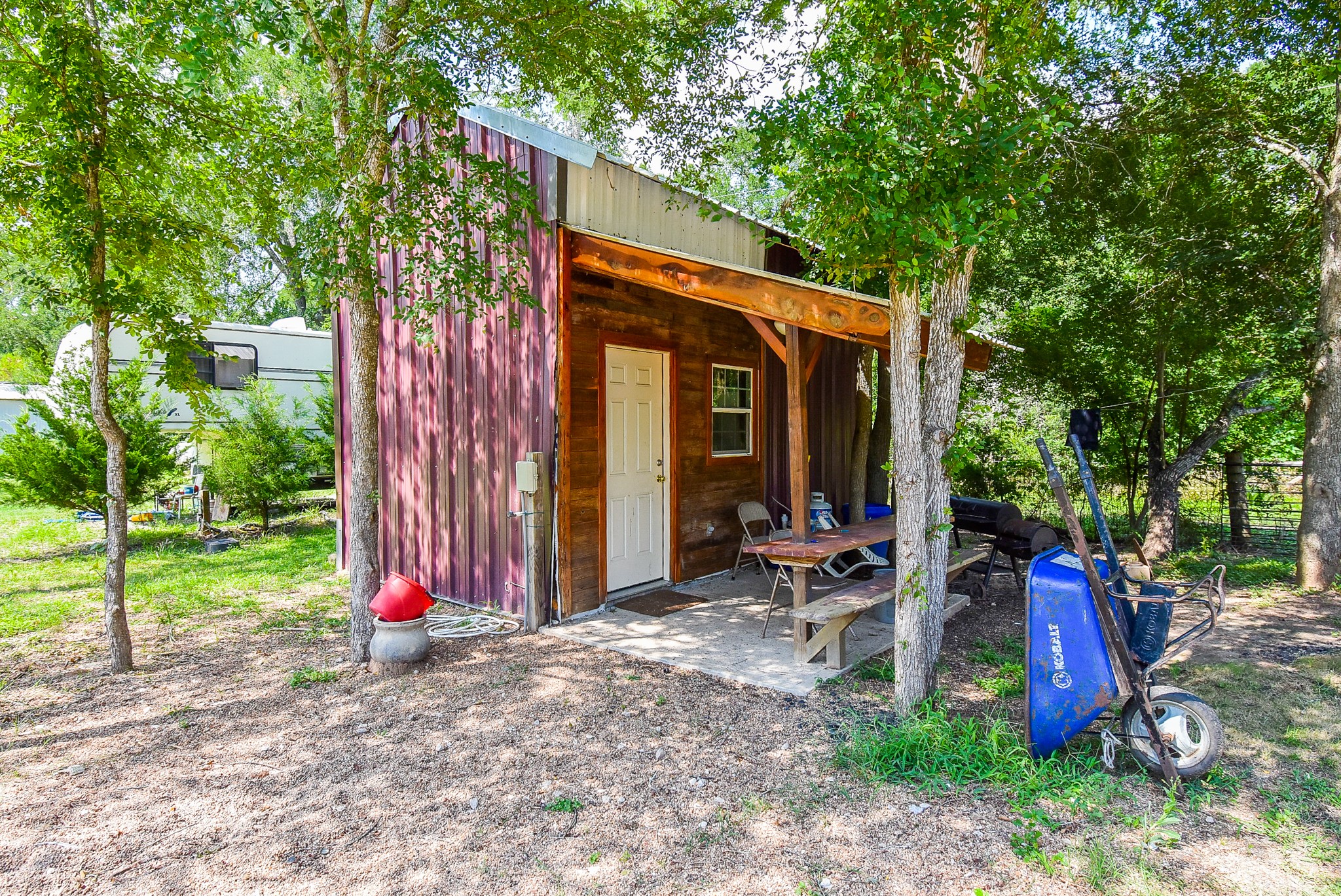 39551 Donigan Road Brookshire, TX 77423 - Photo 15 of 37 a view of a house with backyard and patio