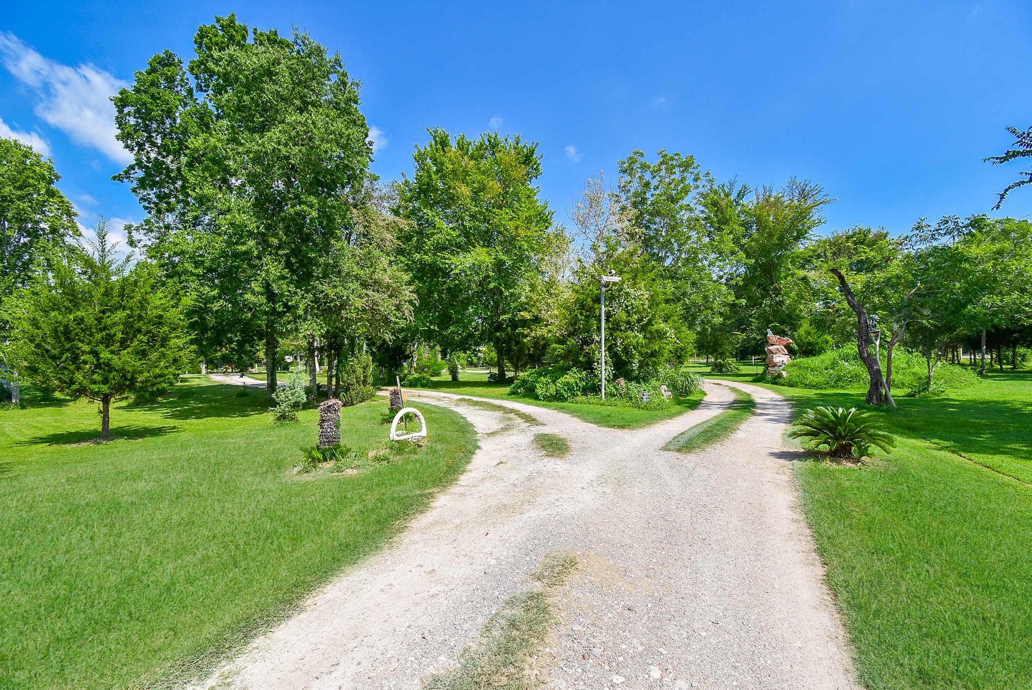 39551 Donigan Road Brookshire, TX 77423 - Photo 2 of 37 a view of a park with plants and trees