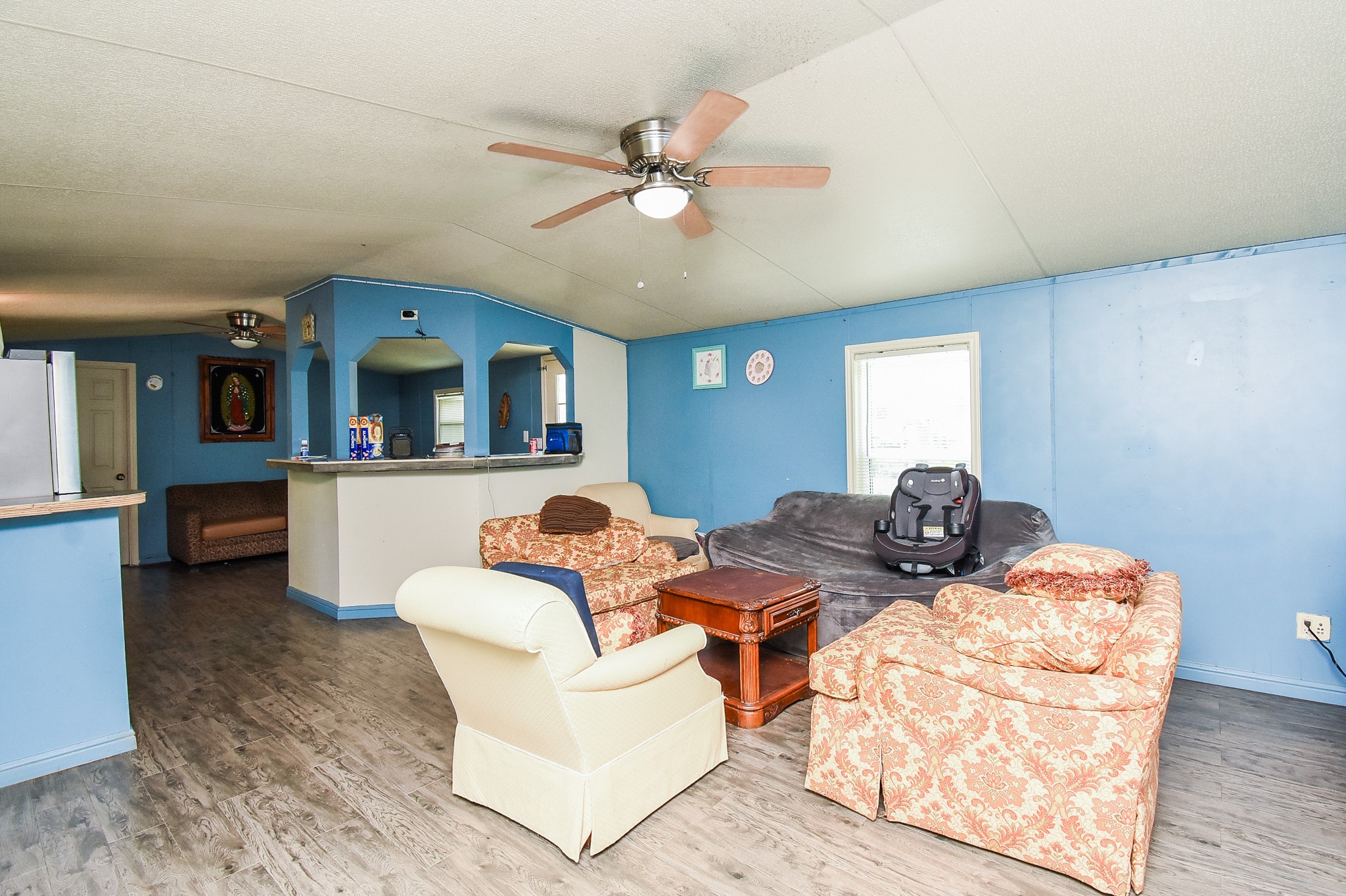 39551 Donigan Road Brookshire, TX 77423 - Photo 34 of 37 a living room with furniture and flat screen tv