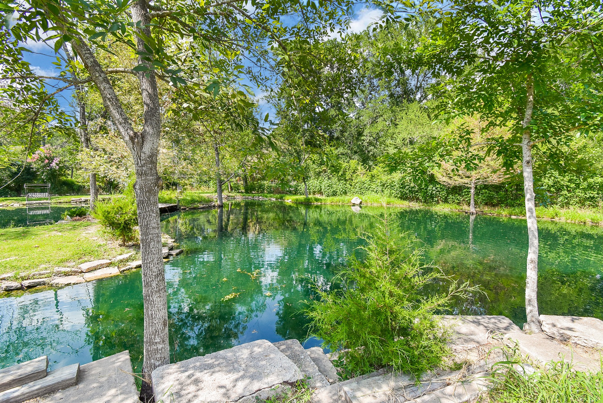 39551 Donigan Road Brookshire, TX 77423 - Photo 4 of 37 a view of a lake with a houses
