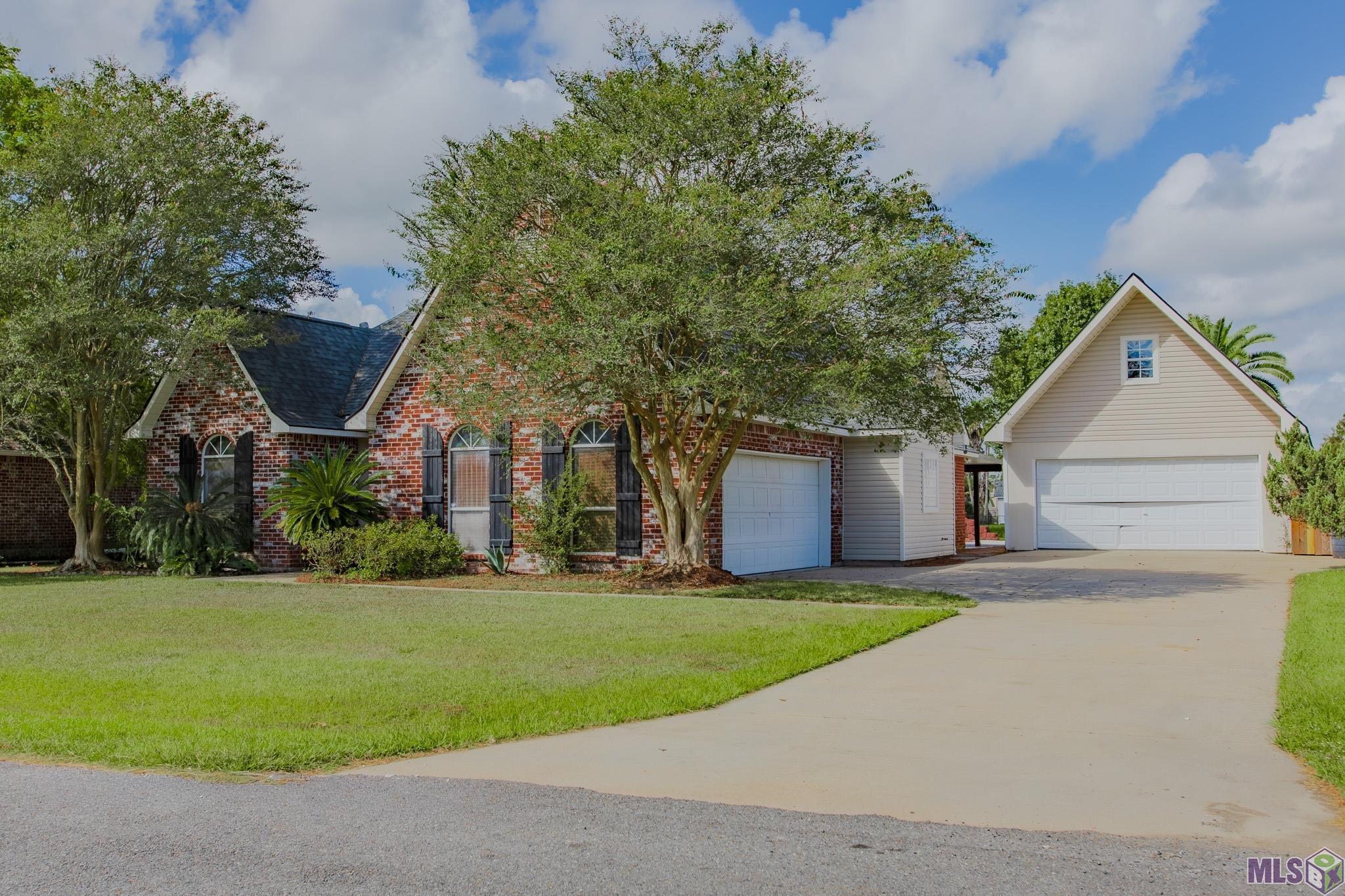 16043 Rawlings Road Prairieville, LA 70769 - Photo 2 of 25 Front Exterior with Detached Workshop