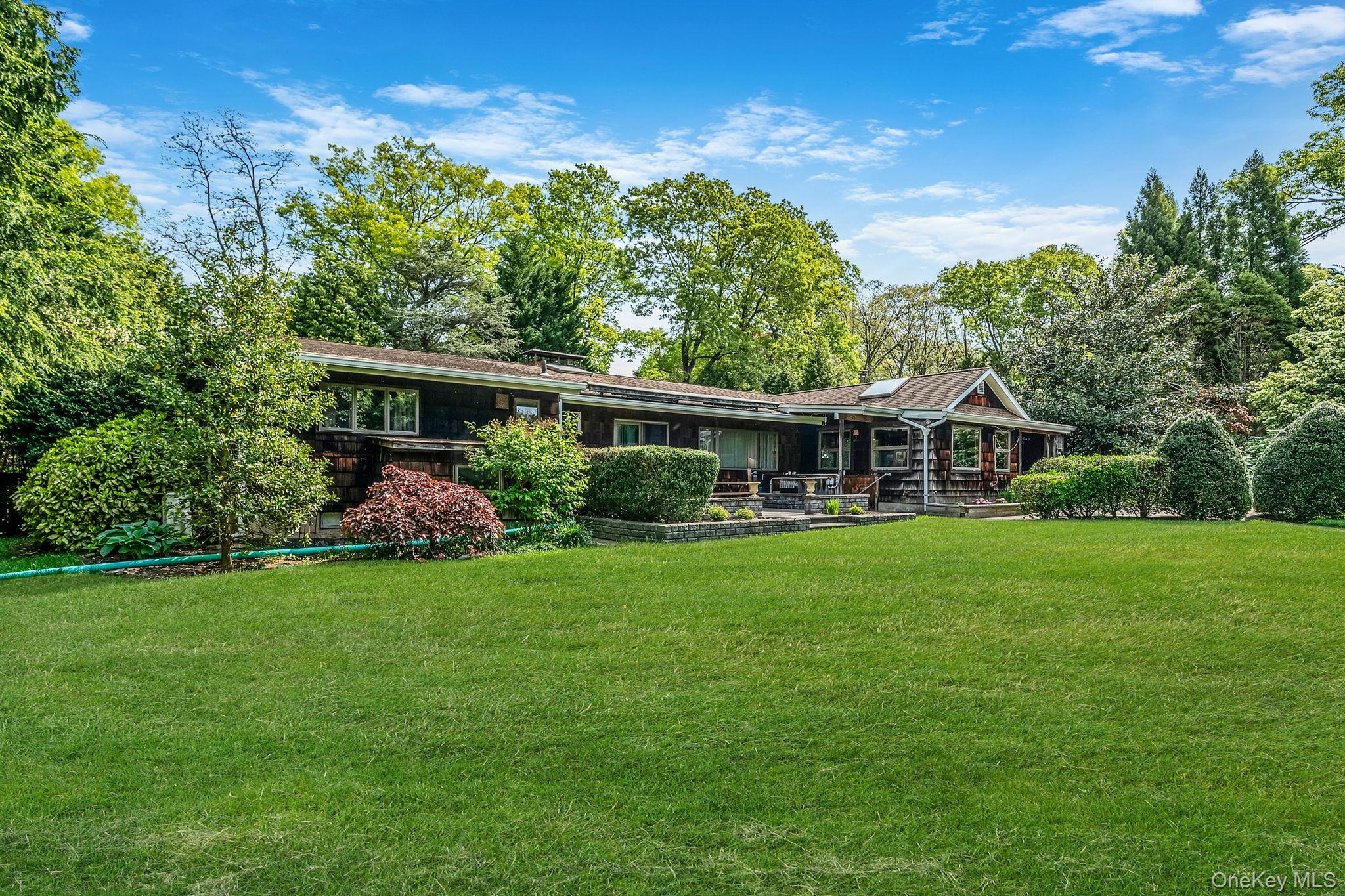 280 Deforest Road North Dix Hills, NY 11746 - Photo 5 of 37 a view of a house with a yard