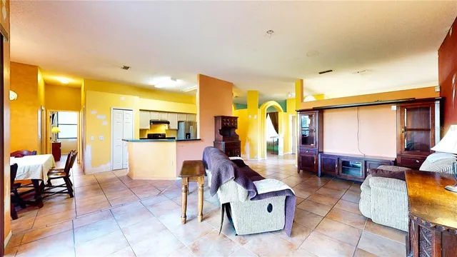 a view of a living room with a large window