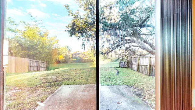a kitchen with a sink and a large window