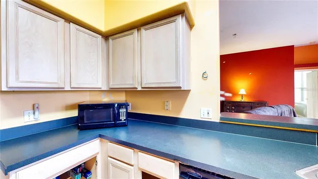 a bathroom with a sink vanity and a mirror