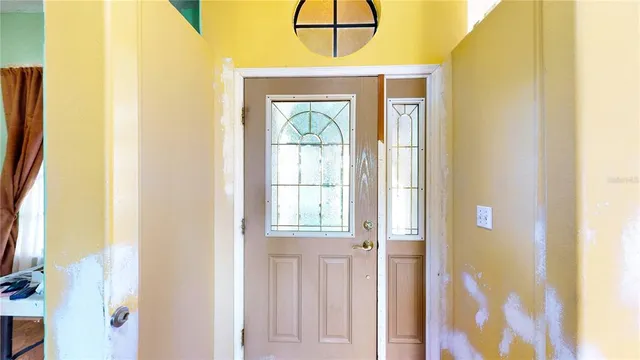 a room with furniture and a window