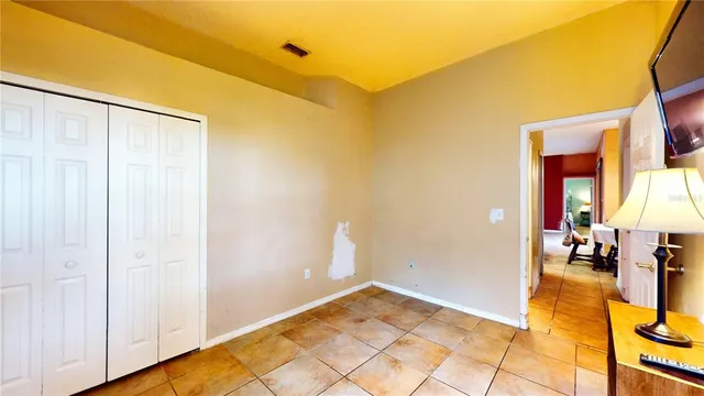 a view of a park with large trees