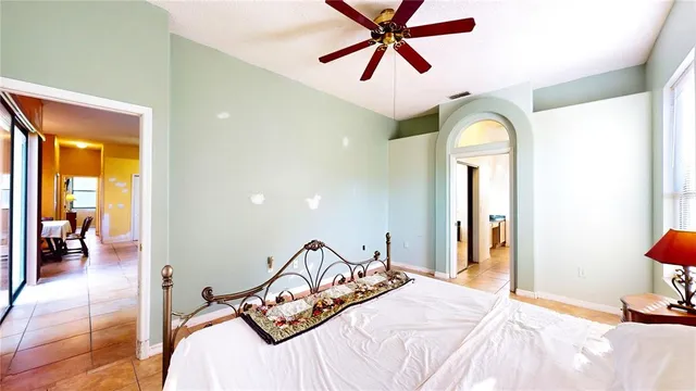 a view of a balcony with table and chairs