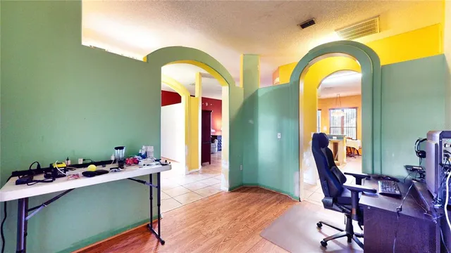 a workspace with furniture and a window