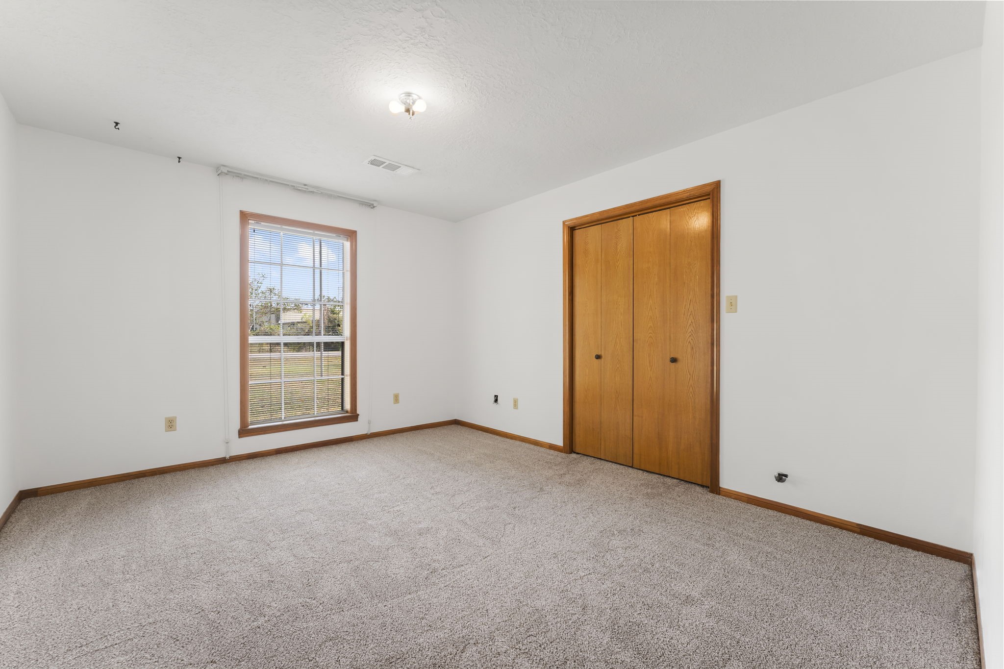 2810 Lilac Street Pasadena, TX 77503 - Photo 23 of 38 a view of an empty room with a window