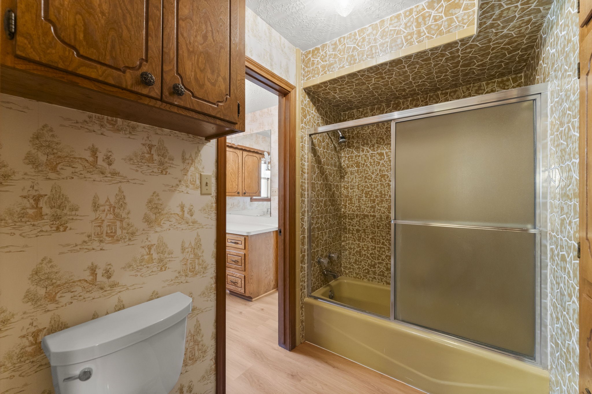 2810 Lilac Street Pasadena, TX 77503 - Photo 25 of 38 a bathroom with a shower and a toilet