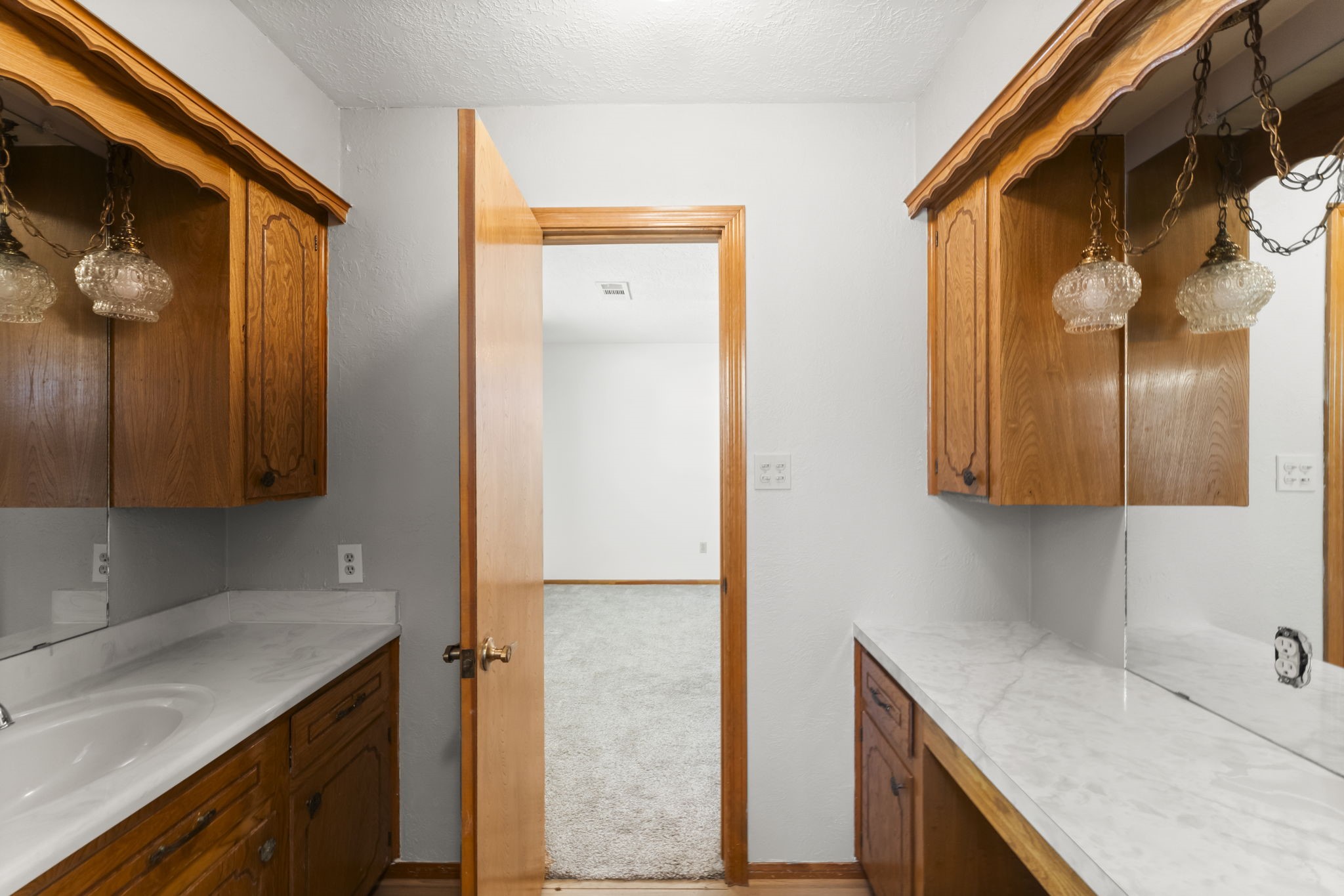 2810 Lilac Street Pasadena, TX 77503 - Photo 29 of 38 a kitchen with a sink and a refrigerator
