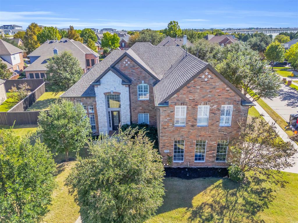 4306 Mitchell Lane Rowlett, TX 75088 - Photo 2 of 39 View of front of house featuring brick siding, stone siding, and a residential view