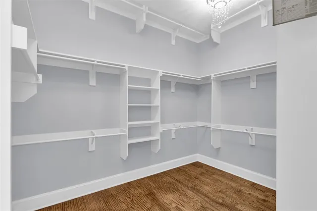 a view of an empty walk in closet
