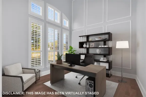 a living room with furniture a rug and a window