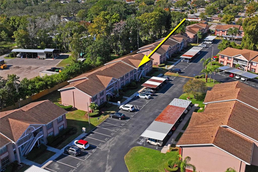 6424 Spring Flower Drive, Unit 24 New Port Richey, FL 34653 - Photo 40 of 66 an aerial view of a house with swimming pool and outdoor seating