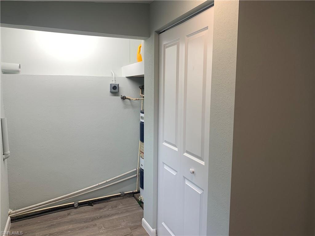 5795 Genesee Parkway, Unit 3 Bokeelia, FL 33922 - Photo 30 of 31 Space for new washer and dryer and cabinet.