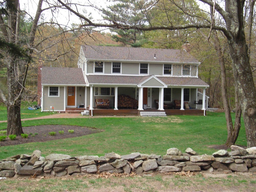 18 Jacob Gates Road Harvard, MA 01451 - Photo 1 of 26 front view of a house with a yard