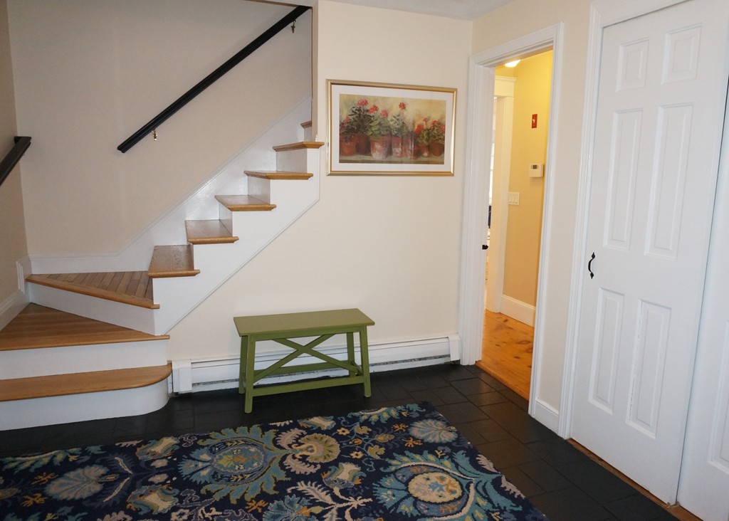 18 Jacob Gates Road Harvard, MA 01451 - Photo 12 of 26 a living room with furniture and a gate