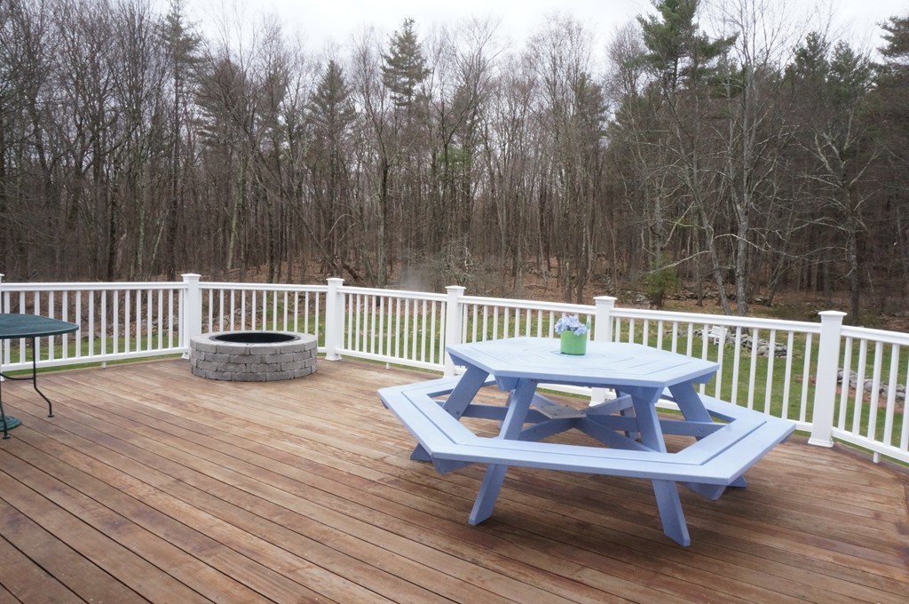 18 Jacob Gates Road Harvard, MA 01451 - Photo 25 of 26 a view of a chair and table on the wooden floor