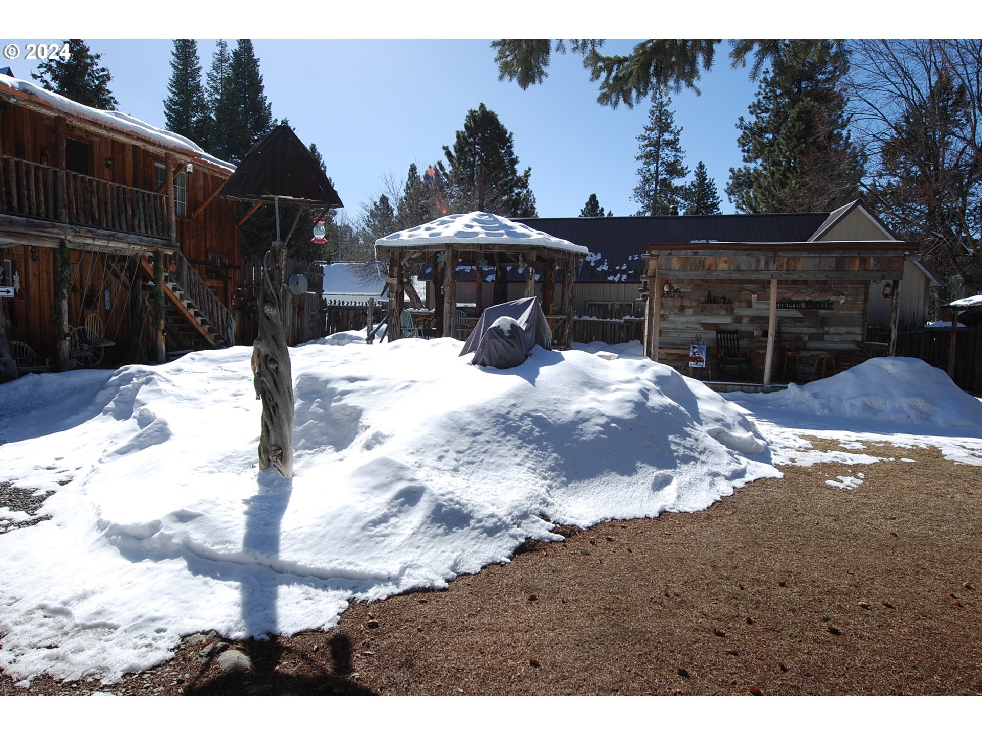 129 Austin Street Sumpter, OR 97877 - Photo 20 of 34 a view of a backyard of the house