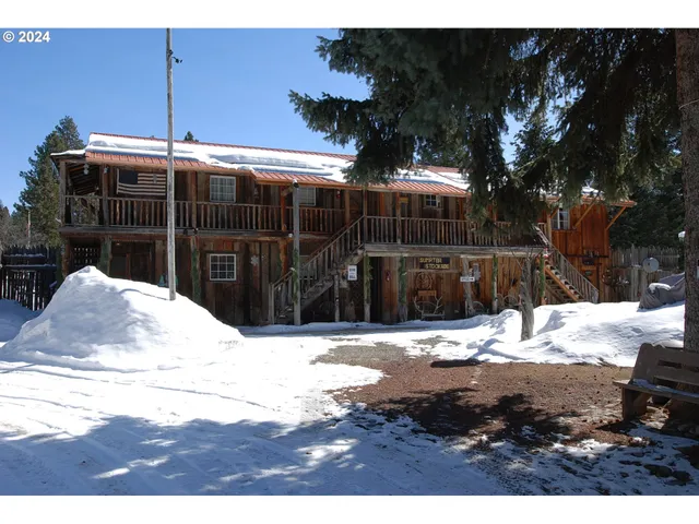 a view of a backyard of snow