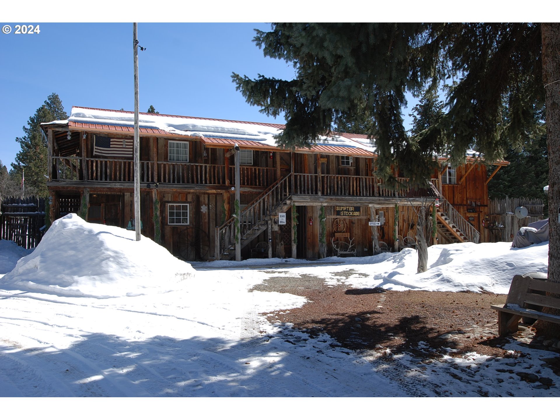 129 Austin Street Sumpter, OR 97877 - Photo 2 of 34 a view of a backyard of snow