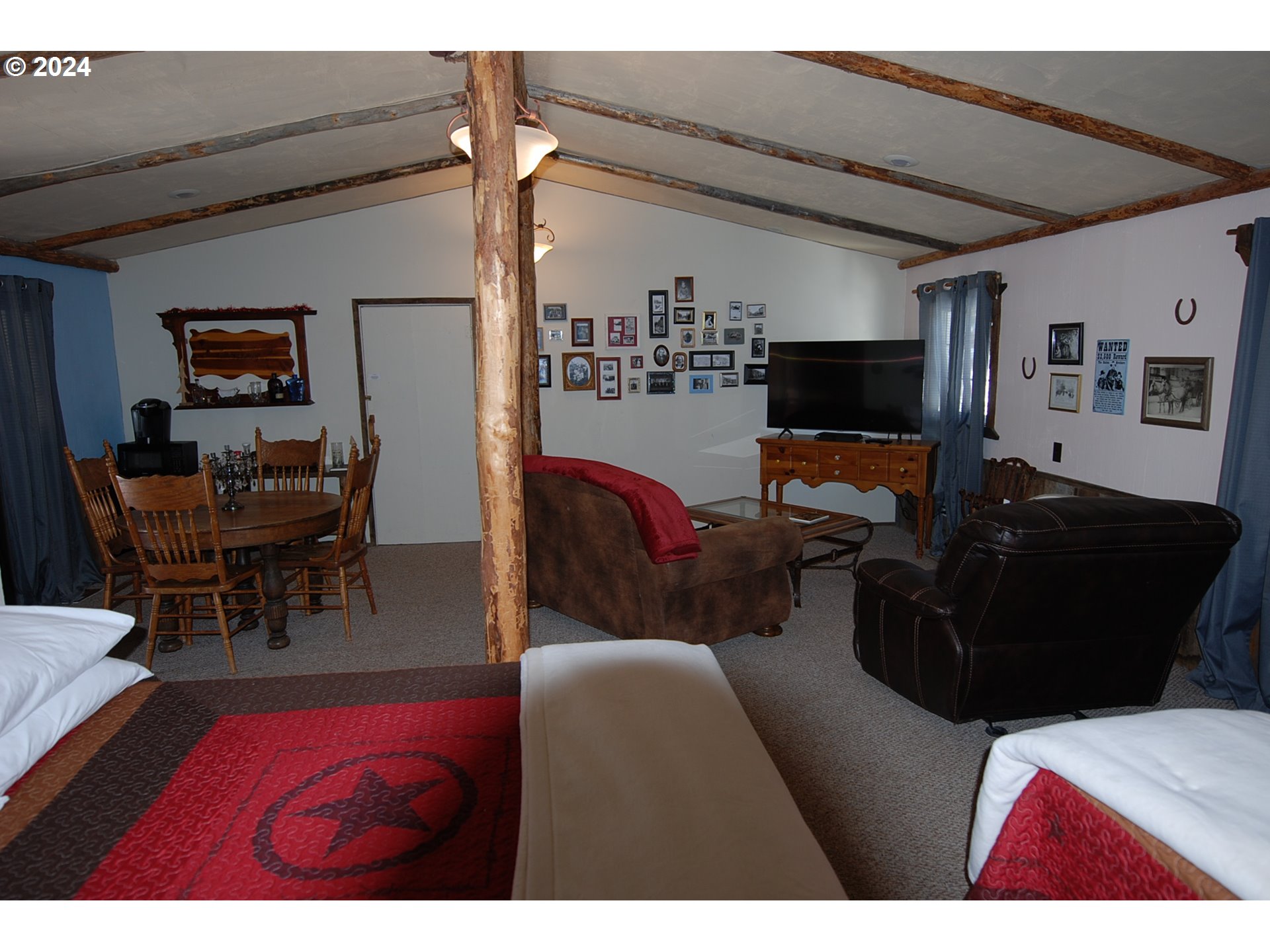 129 Austin Street Sumpter, OR 97877 - Photo 29 of 34 a living room with furniture and a flat screen tv