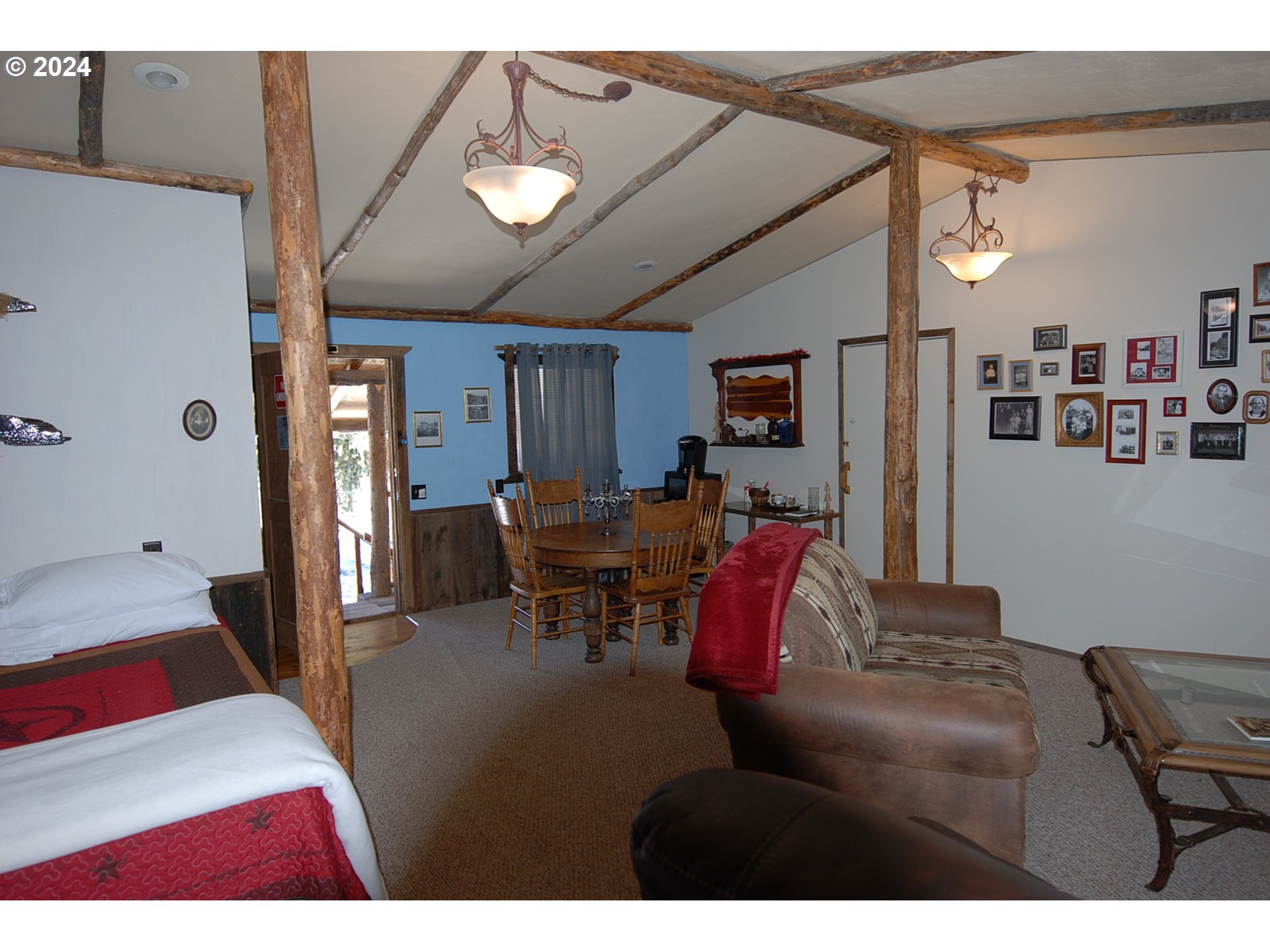 129 Austin Street Sumpter, OR 97877 - Photo 30 of 34 a living room with furniture and a flat screen tv