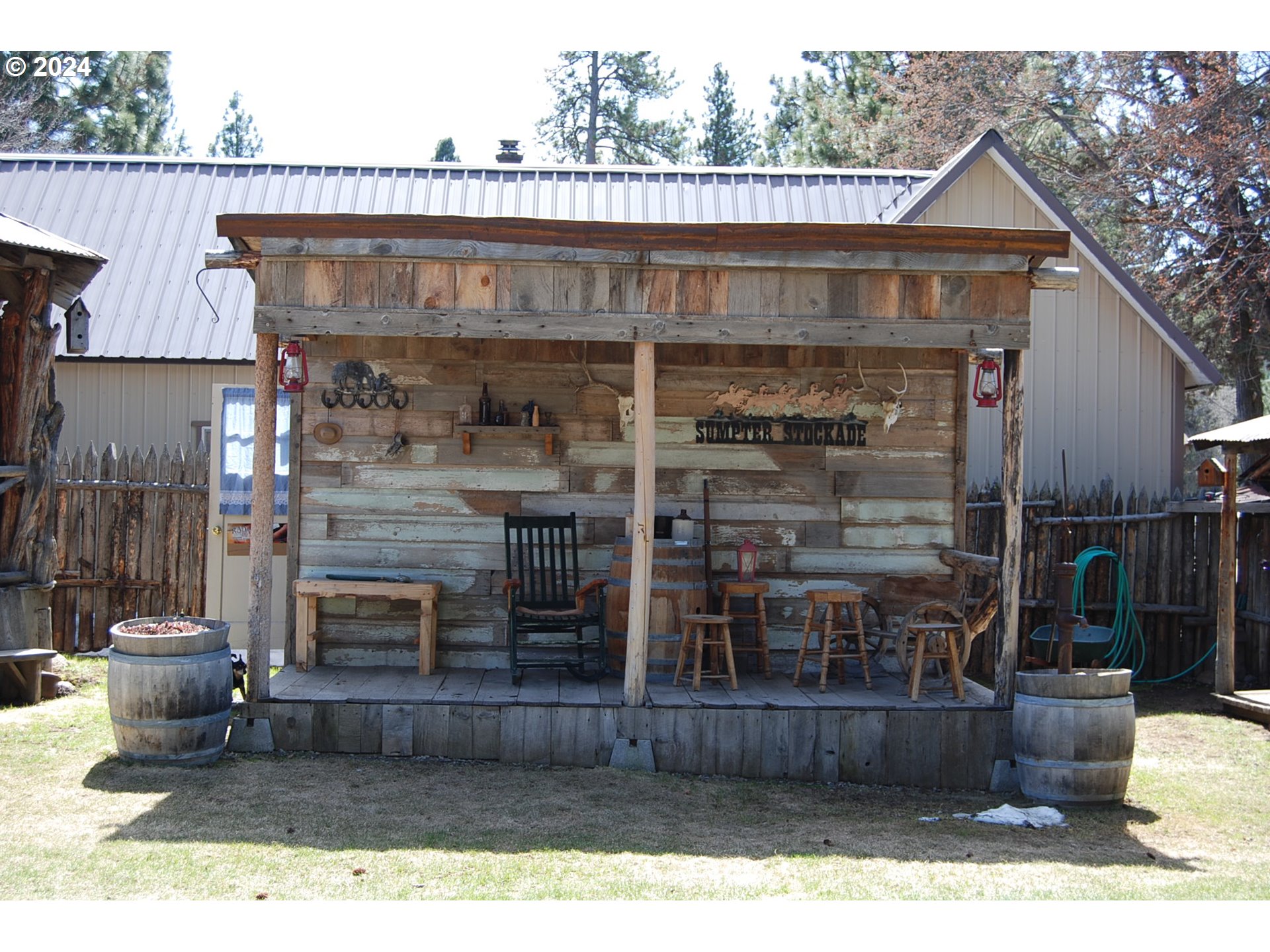 129 Austin Street Sumpter, OR 97877 - Photo 7 of 34 a view of a patio with table and chairs
