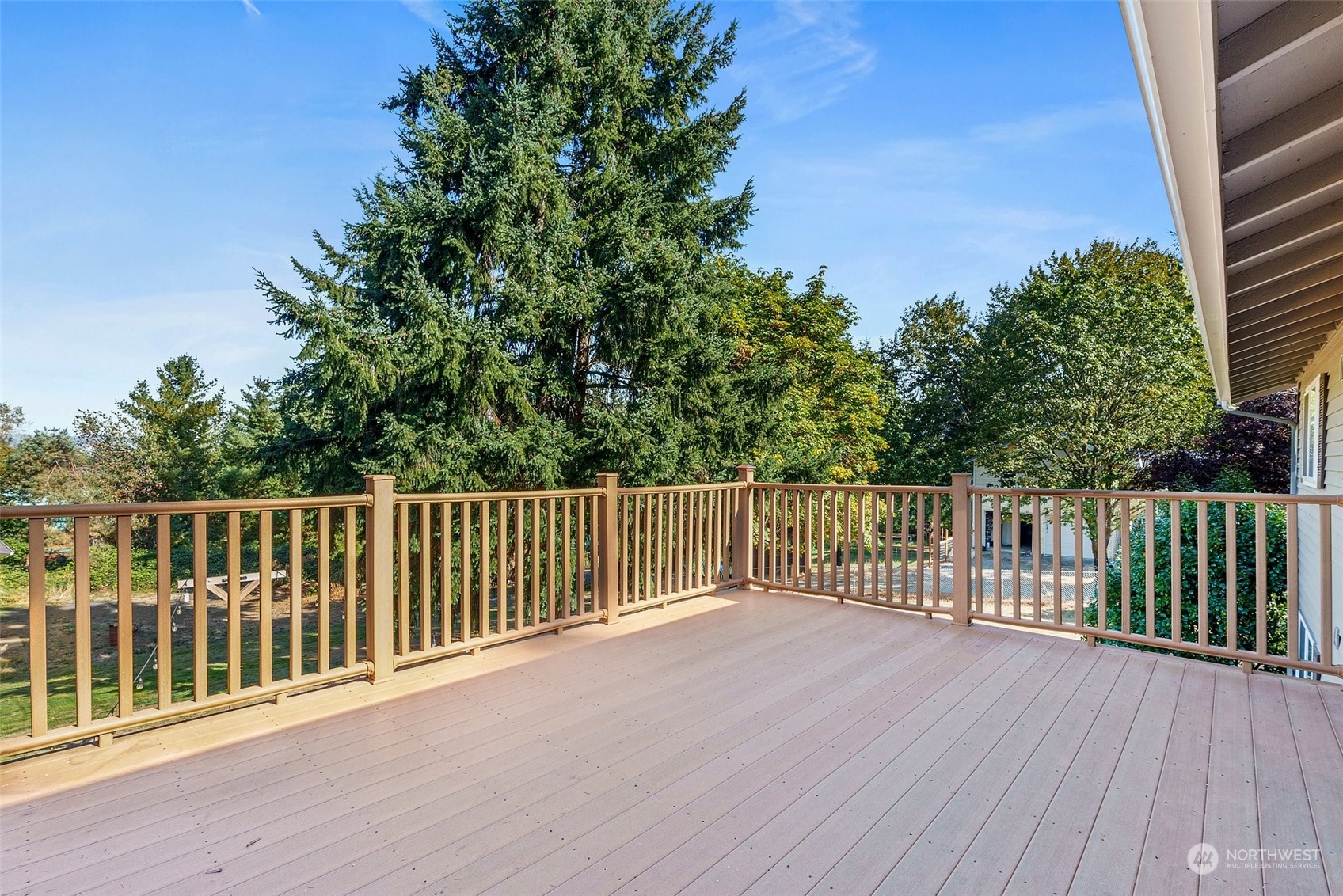 203 Sommerville Road Chehalis, WA 98532 - Photo 13 of 39 a balcony with wooden floor in front of it