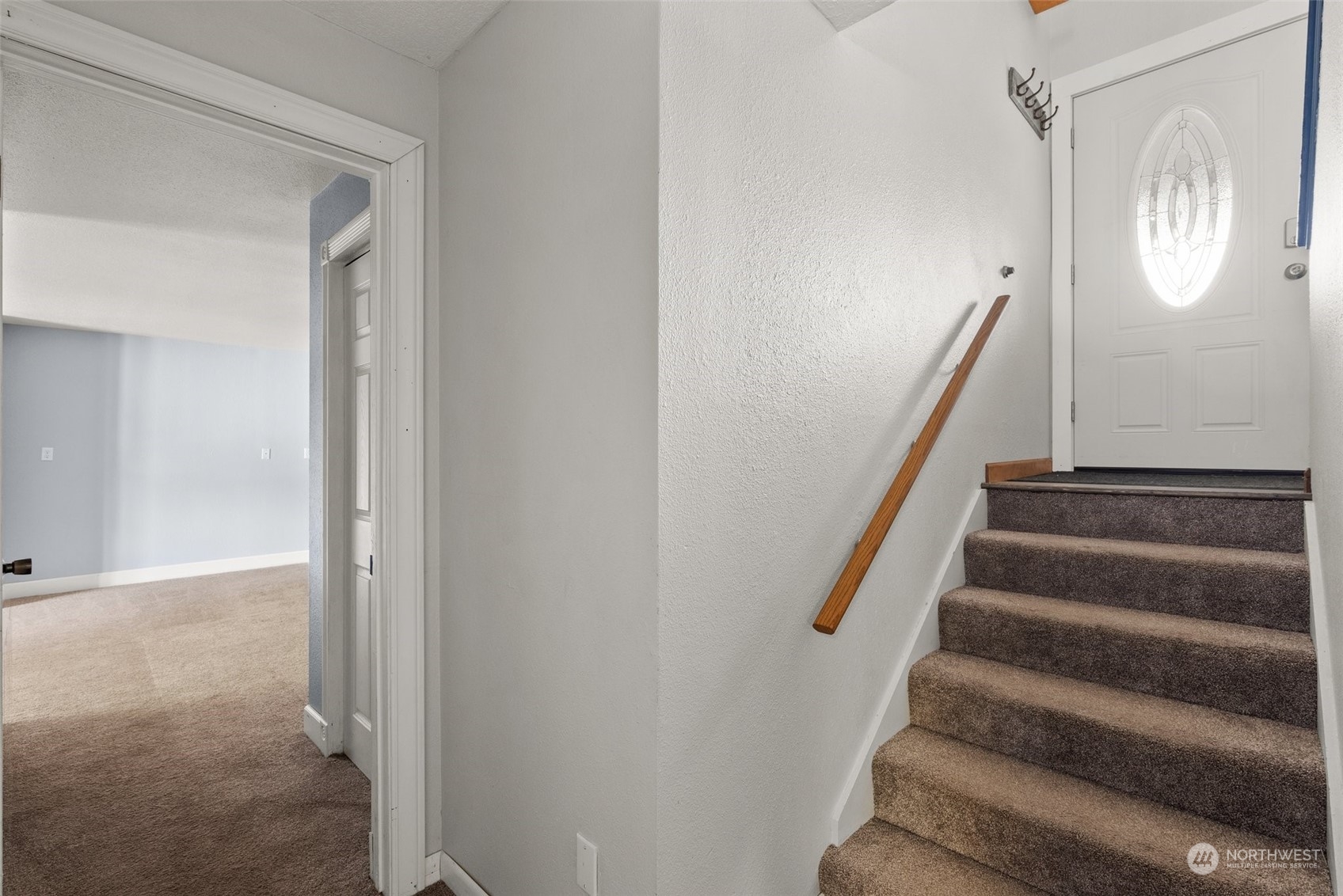 203 Sommerville Road Chehalis, WA 98532 - Photo 20 of 39 a view of staircase with wooden floor and white walls