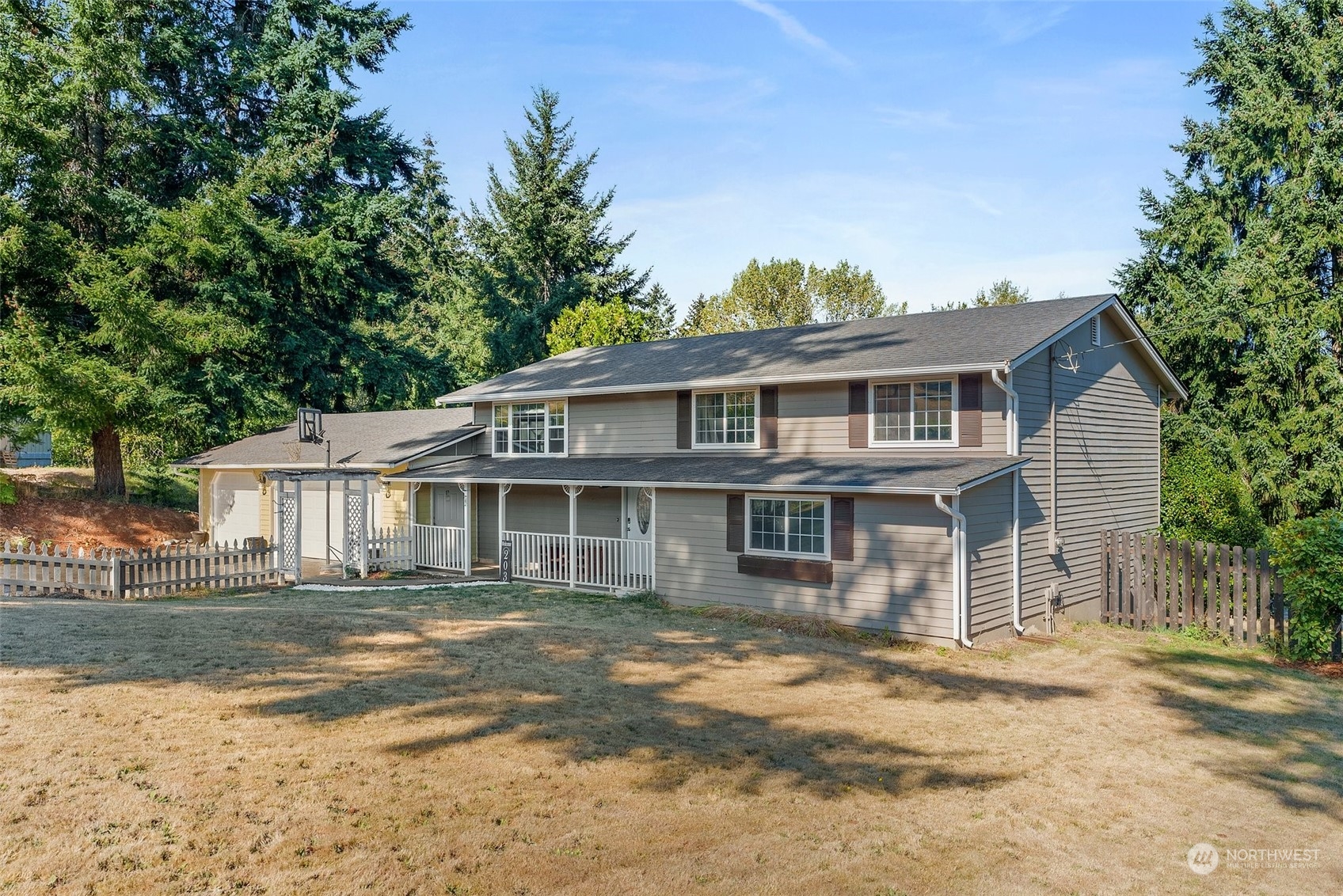 203 Sommerville Road Chehalis, WA 98532 - Photo 2 of 39 a front view of a house with a garden
