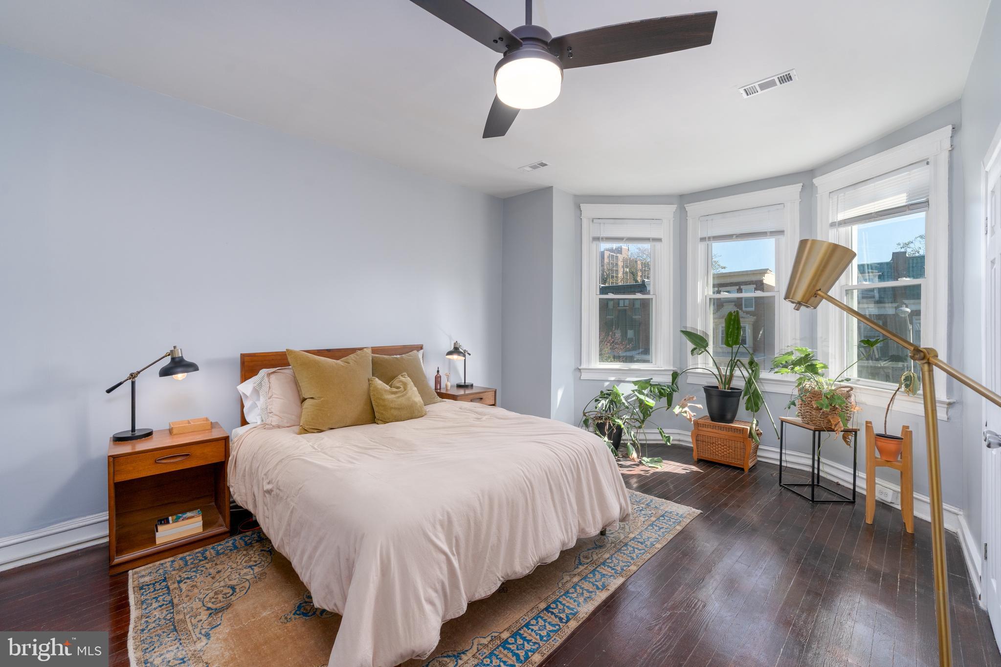 2512 Brookfield Avenue Baltimore, MD 21217 - Photo 14 of 35 a bedroom with bed and wooden floor
