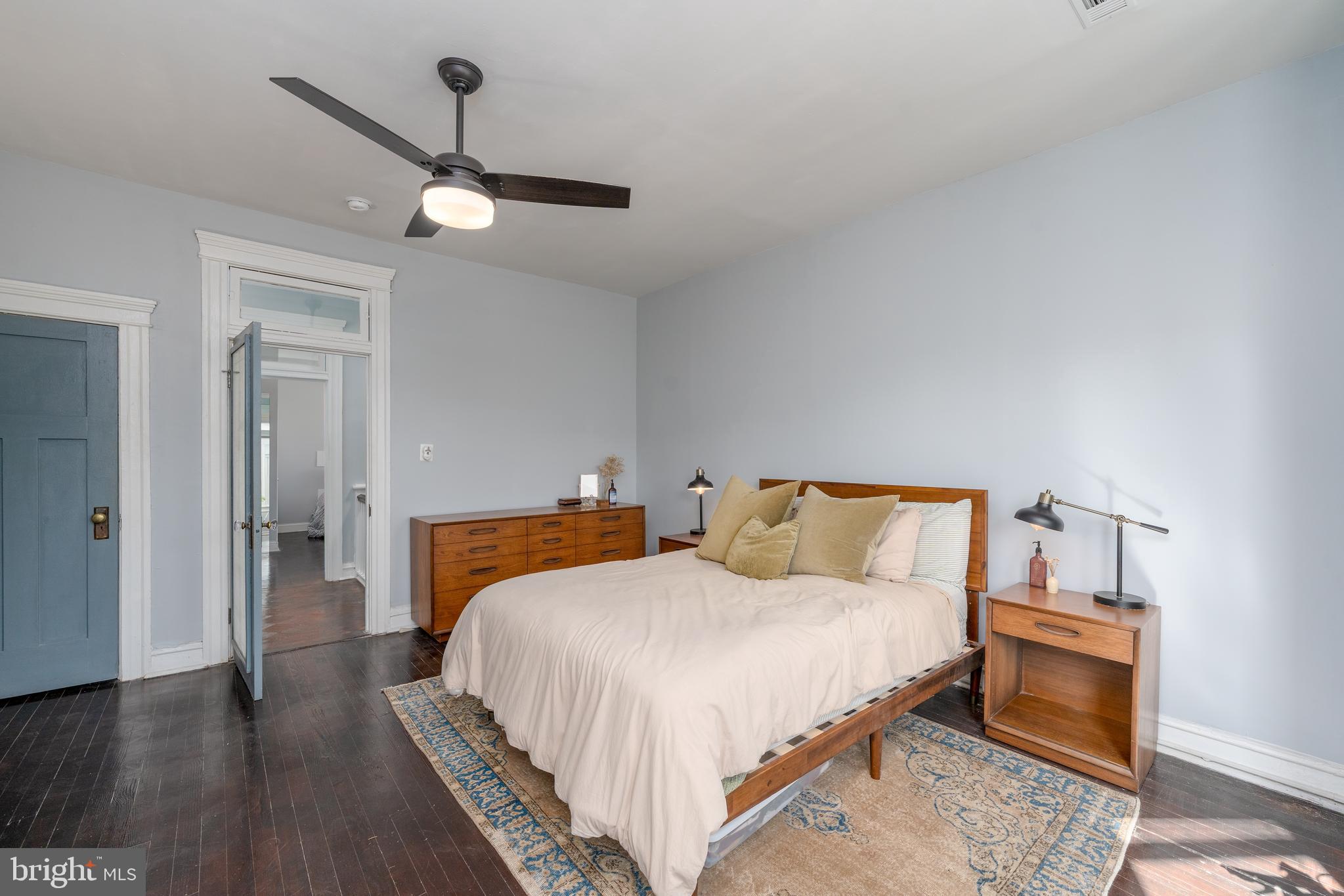 2512 Brookfield Avenue Baltimore, MD 21217 - Photo 15 of 35 a bedroom with a bed and wooden floor