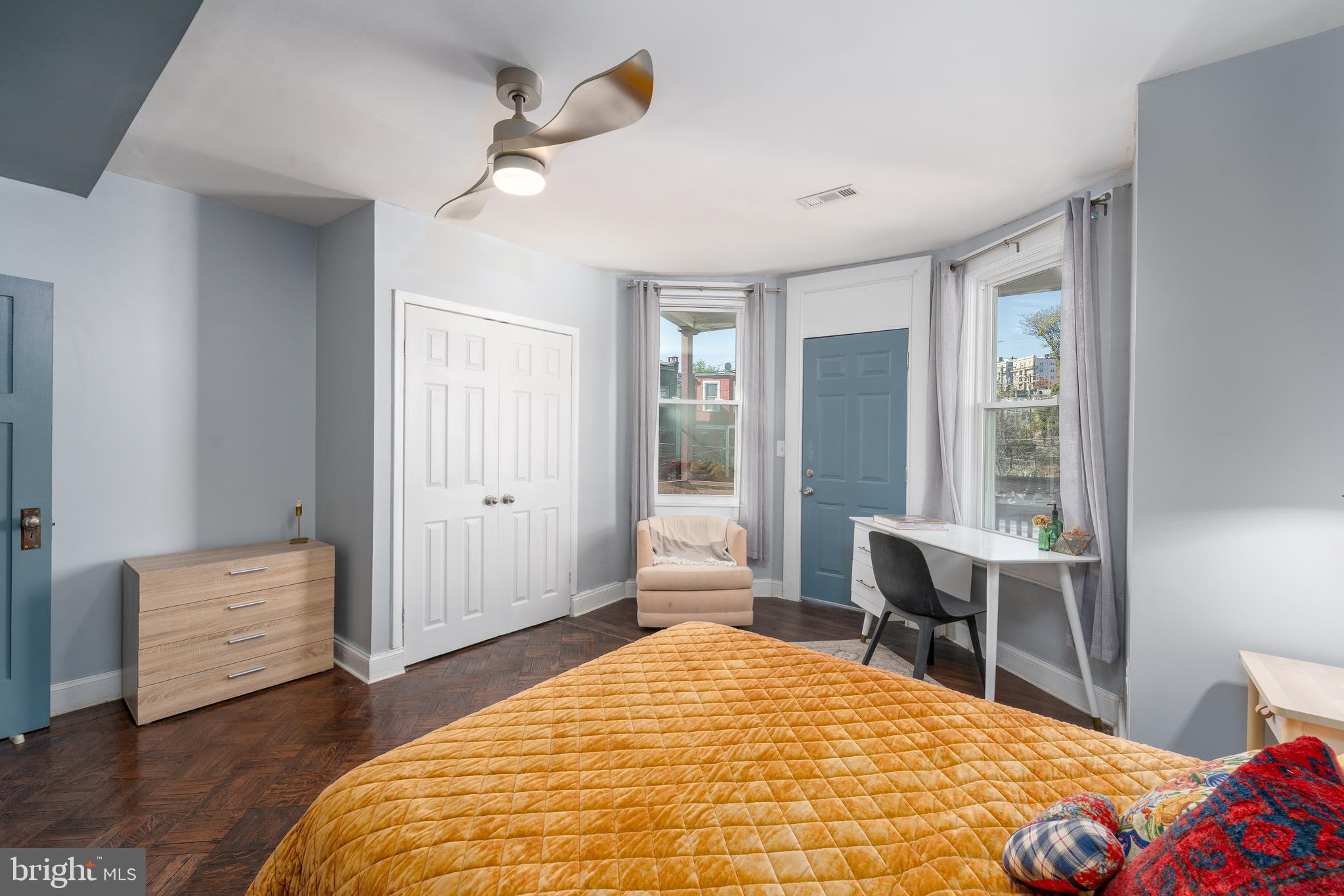 2512 Brookfield Avenue Baltimore, MD 21217 - Photo 22 of 35 a bedroom with a bed and a table in it
