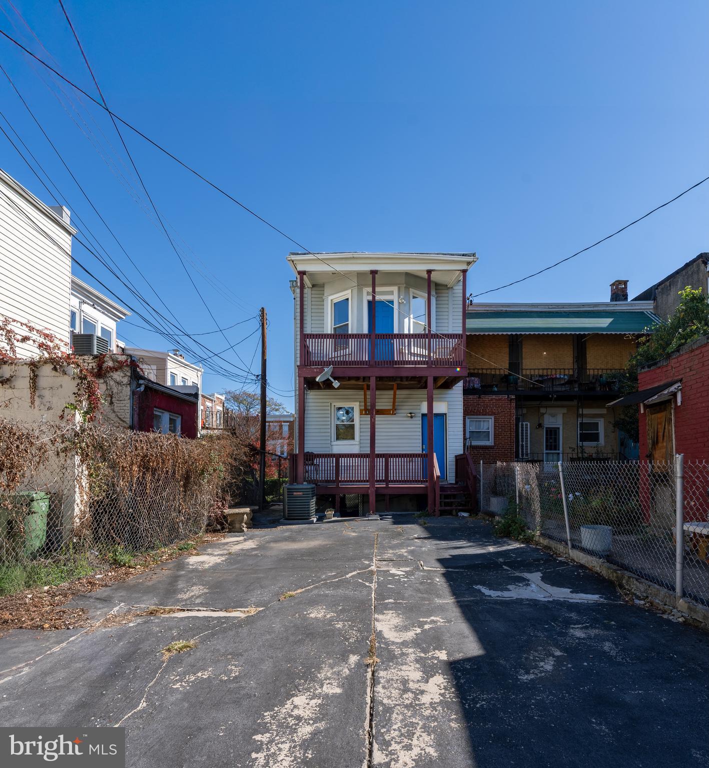 2512 Brookfield Avenue Baltimore, MD 21217 - Photo 31 of 35 a front view of a house with garden