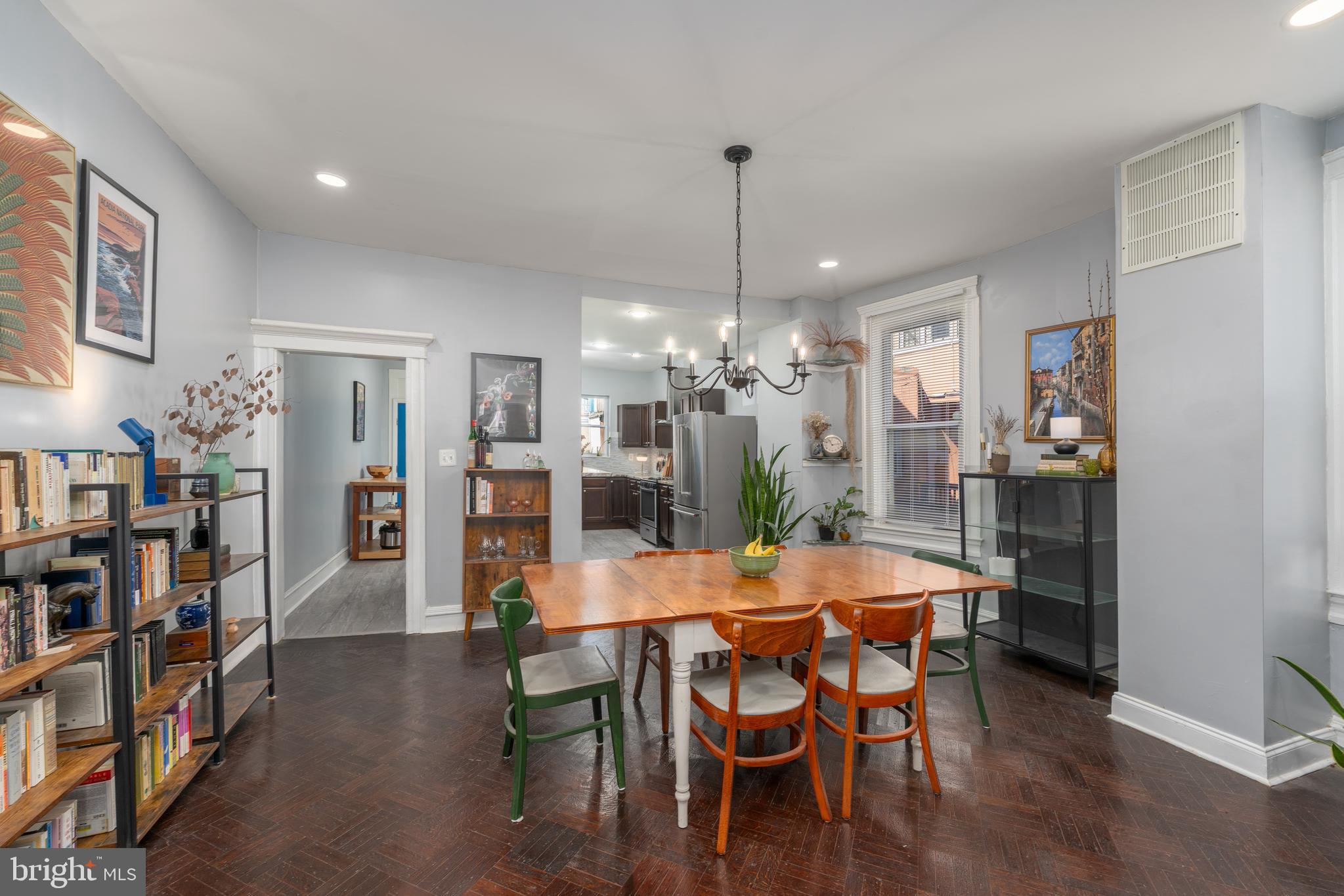 2512 Brookfield Avenue Baltimore, MD 21217 - Photo 9 of 35 a view of a dining room with furniture and wooden floor