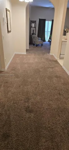 a view of a livingroom with wooden floor