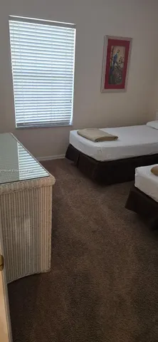 a bathroom with a toilet and a bathtub