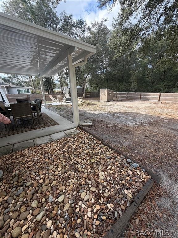 13591 Southwest 112th Street Dunnellon, FL 34432 - Photo 20 of 24 a view of a backyard of the house