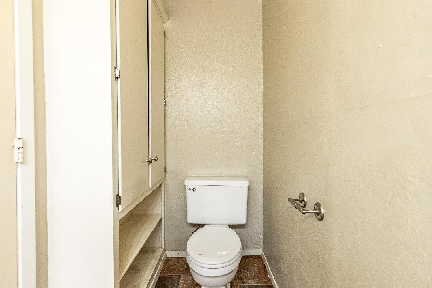 4737 48th Street Lubbock, TX 79414 - Photo 11 of 34 a bathroom with a toilet
