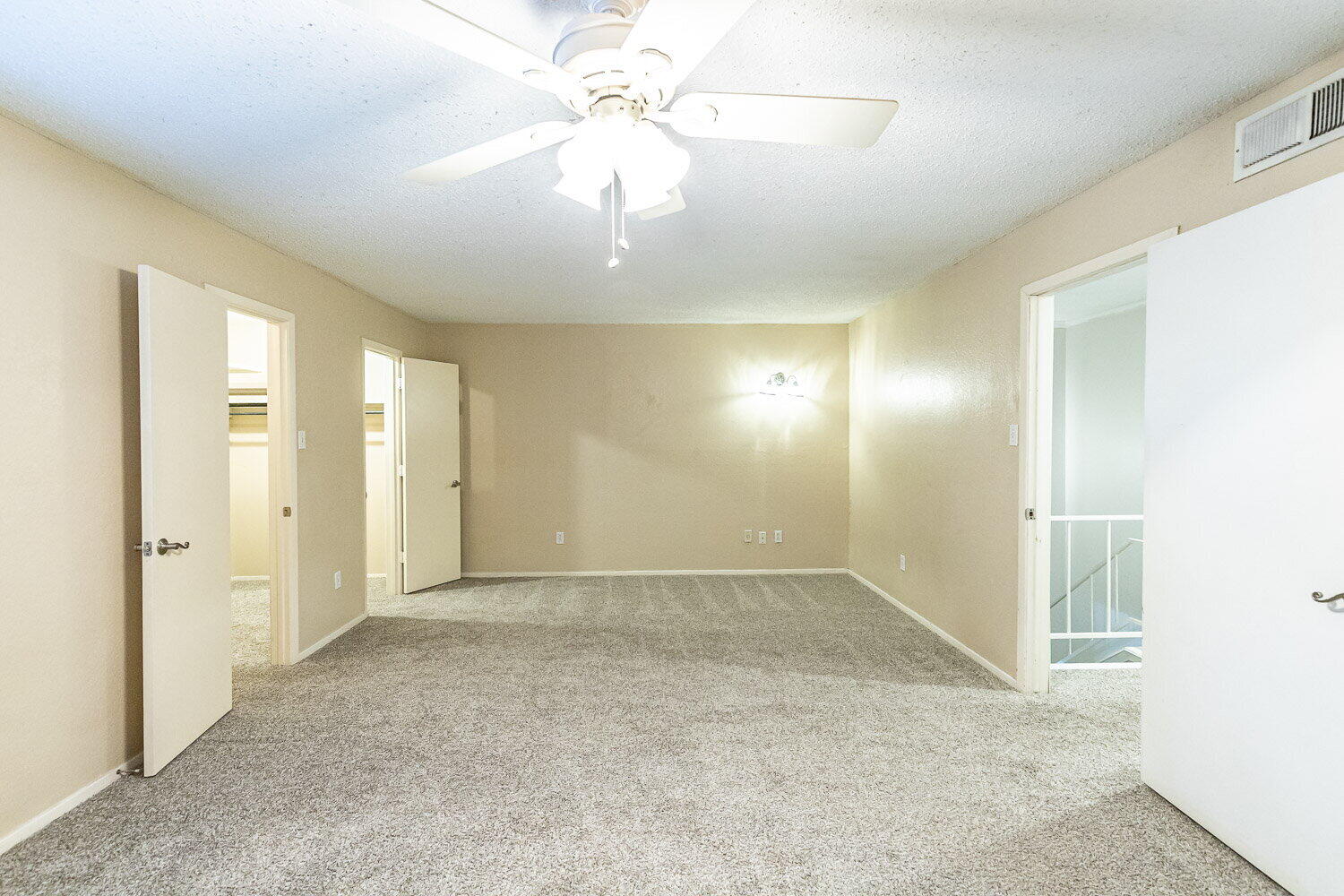 4737 48th Street Lubbock, TX 79414 - Photo 21 of 34 an empty room with fan and entrance