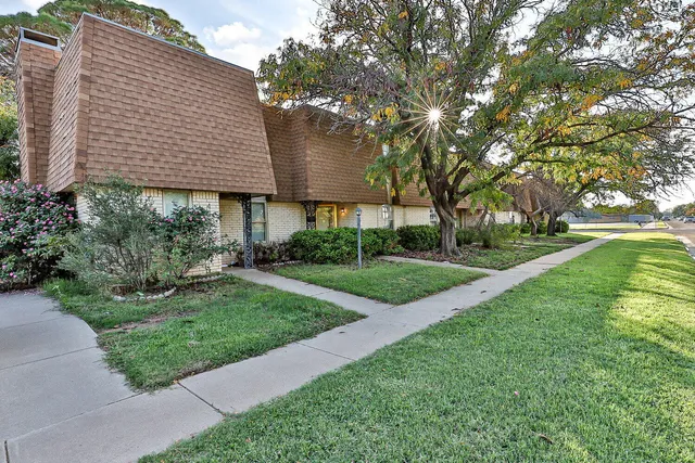 a view of a back yard of the house