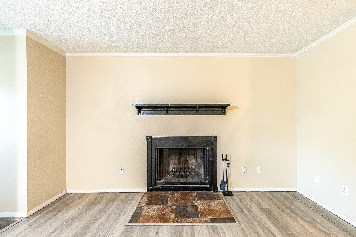 4737 48th Street Lubbock, TX 79414 - Photo 6 of 34 a living room with a fireplace