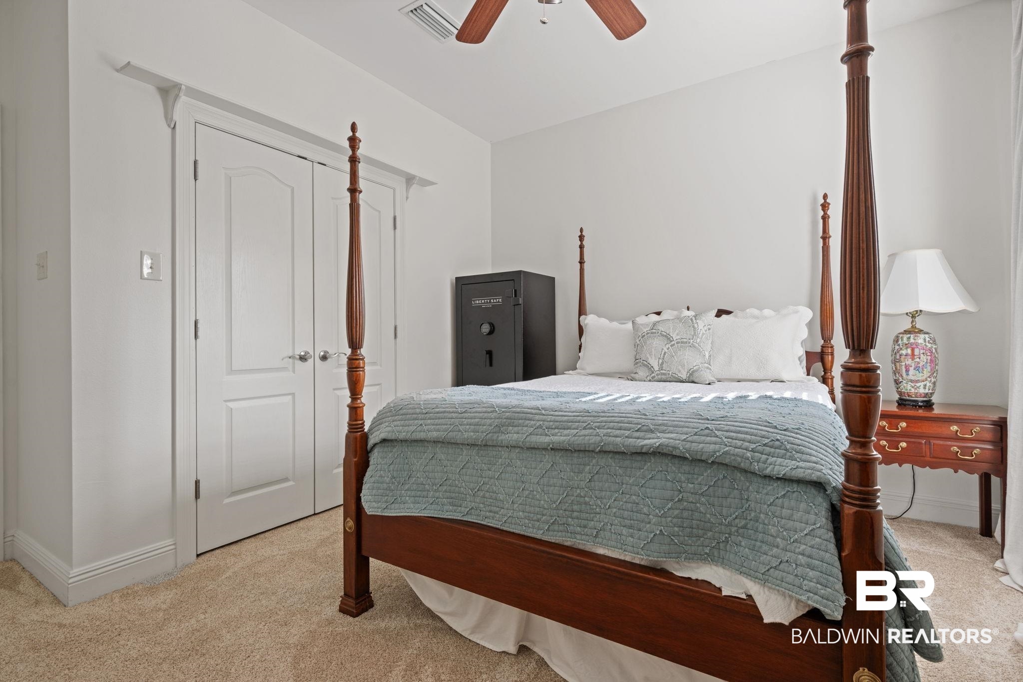 4771 Pecan Ridge East Mobile, AL 36619 - Photo 31 of 48 Bedroom with light colored carpet, a closet, and a ceiling fan