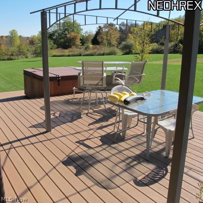 6099 Grove Road Clinton, OH 44216 - Photo 15 of 20 Deck with hot tub and astounding views of property! Great place to unwind!