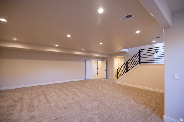 904 South 1900 West Layton, UT 84041 - Photo 17 of 19 Unfurnished living room featuring light carpet and recessed lighting