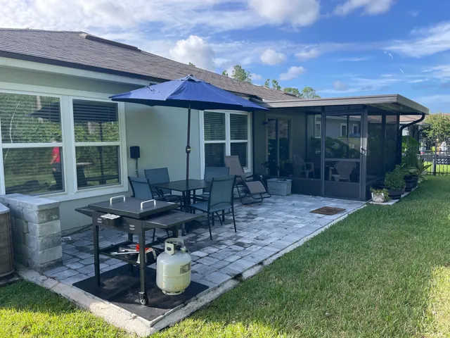 a view of a park with large trees
